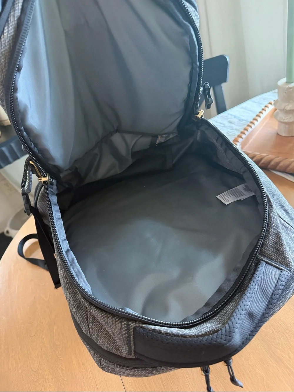 The North Face Borealis Backpack in Charcoal and Black with Gold Logo